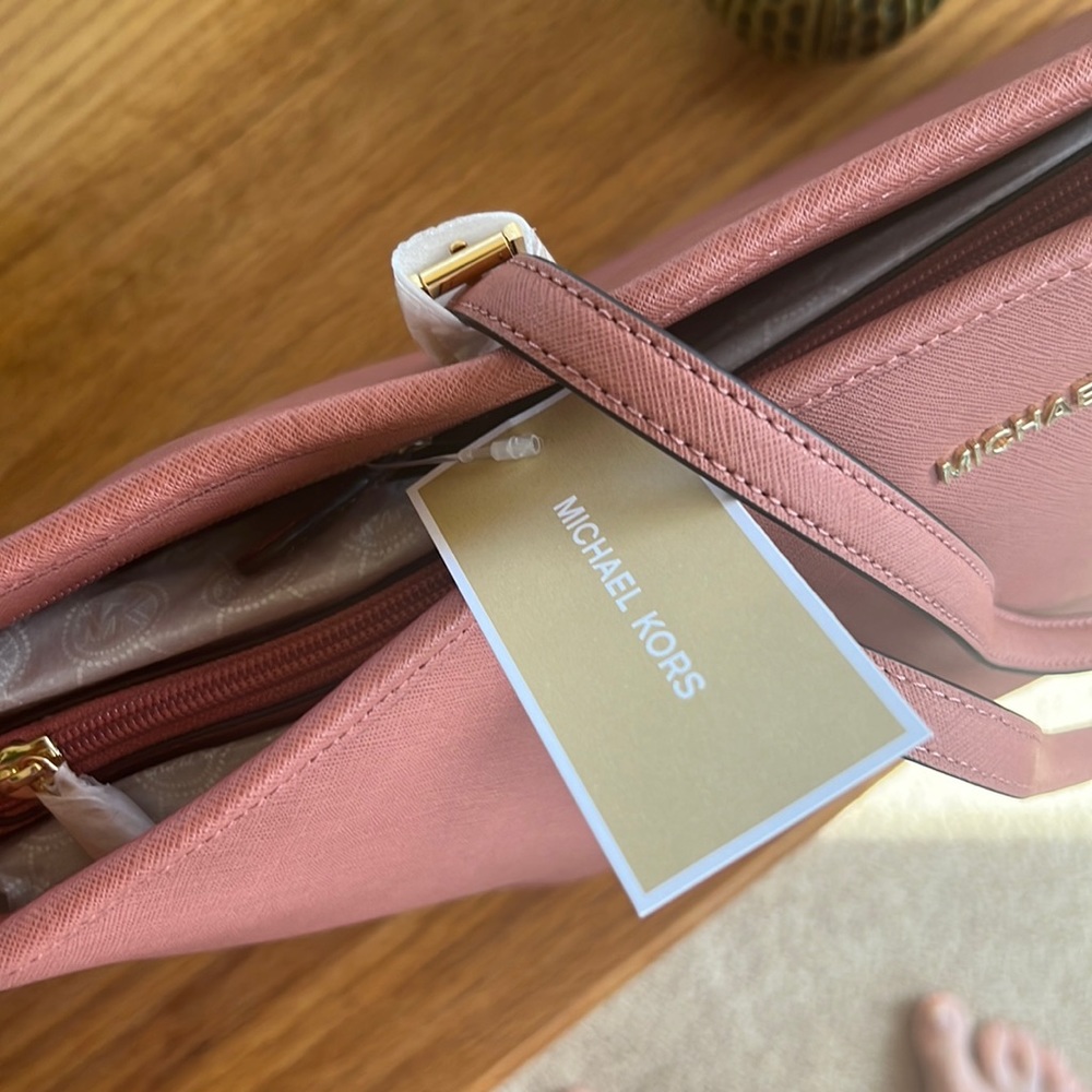 This is a brand new Michael Kors tote bag I bought and never used .